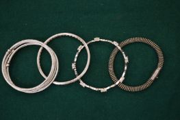 Four various bracelets.