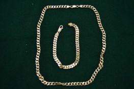 A heavy silver chain and bracelet.