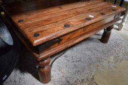 A hardwood coffee table.