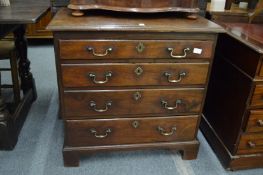 A good small Georgian chest of four graduated long drawers on bracket feet.
