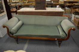 A 19th century mahogany framed scroll end settee on turned supports with brass castors.