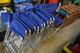 A set of six aluminium and blue canvas folding directors style chairs.
