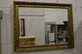 Decorative gilt framed mirror.
