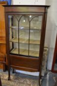 An Edwardian mahogany standing display cabinet.