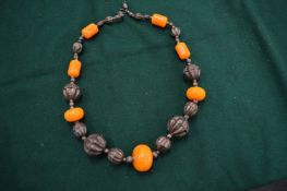 A chunky bead necklace.