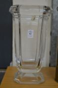 A large cut glass vase.