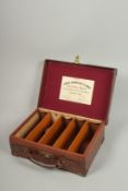 A JAMES WOODWARD & SONS LEATHER SHOTGUN CARTRIDGE CASE, with five oak lined compartments.