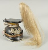 A 15TH REGIMENT LANCASHIRE CHAPSKA leather and white metal with badge and plume.