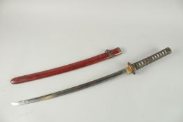A GOOD JAPANESE SWORD with tsuba and shagreen handle and metal sheath. 82cm long.