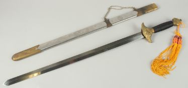 A THEATRICAL SWORD in a chrome sheath. 90cm long.