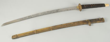 A JAPANESE SWORD with bound handle, tsuba an signed blade in an etched metal sheath.