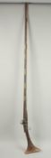 AN INDIAN FLINTLOCK RIFLE, 187cm long.