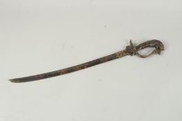 A CEYLONESE 18TH CENTURY SWORD with enamel head hummel and gilded blade. 62cm long.