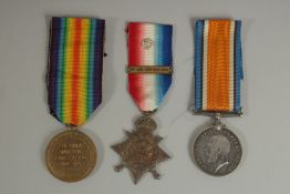 HERBERT C.BAKER. PTE 7458. End of Service. Wounded Overseas. TRIO with ribbons. Mons Star with