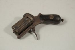 A SMALL SIX CHAMBER PEPPER POT PISTOL. 3.5ins long.