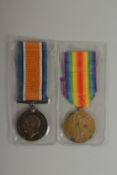 JAMES BRENNAN. MARCH R. PTE 202979. MANCHESTER REGT. DUO with ribbons.