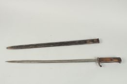 A WW1 BAYONET in a metal sheath. 69cm long.