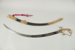 A BRITISH INDIAN ARMY CURVED SWORD with blue blade, brass handle and leather scabbard. Bears