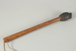 A WWI TRENCH CLUB, circa. 1916. 50cm long.