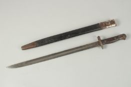 A WW1 BAYONET in a metal and leather sheath. 58cm long.