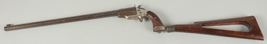 A FRANK WESSON NOBLE SINGLE SHOT GUN. Circa. 1870, 86cm long.