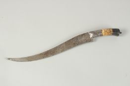 A LARGE PERSIAN ENGRAVED STEEL DAGGER.