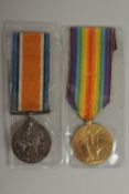 EDGAR G. SALT. MANCHESTER REGIMENT. PTE 52208. DUO with ribbons.