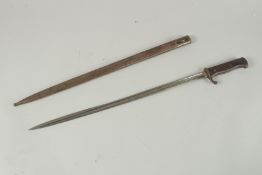 A WWI K98 BAYONET in a metal sheath. 68cm long.