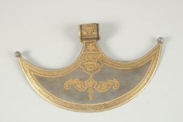 AN OTTOMAN GOLD INLAID STEEL AXE HEAD, 30cm across.