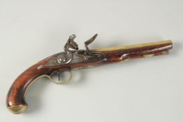 A RARE ARCHERS FLINTLOCK PISTOL with brass barrel and furnishings. 36cm long.