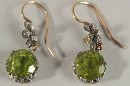 A PAIR OF ANTIQUE PERIDOT AND DIAMOND EARRINGS.