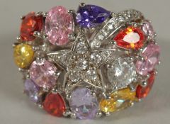 A .925 SILVER MULTI COLOURED STONE RING.