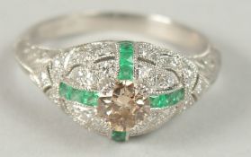 AN ORNATE EMERALD AND DIAMOND RING SET IN PLATINUM, FANCY BROWN OLD CUT DIAMOND, 0.41ct, Emerald,s