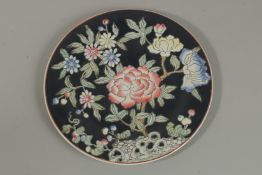 A CHINESE MACAU PORCELAIN PLATE with floral decoration, character mark to base. 27cm high.