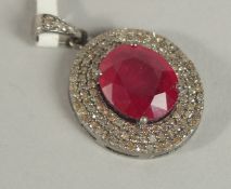 A GOOD DIAMOND AND RUBY PENDANT.