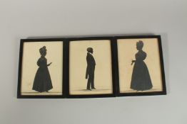 THREE VICTORIAN FRAMED AND GLAZED SILHOUETTES. 22cm x 16cm.