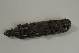 A 19TH CENTURY CARVED WOOD FIGURE. 26cm high.