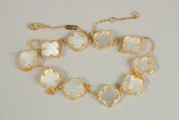 A SILVER GILT AND MOTHER OF PEARL NECKLACE.