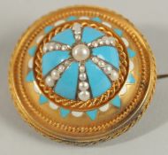 AN 1860'S ARCHAEOLOGICAL REVIVAL 15CT GOLD TURQUOISE ENAMELLED BROOCH.