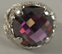 A .925 SILVER BLUE STONE RING.