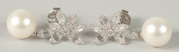 AN 18CT GOLD, PEARL AND DIAMOND, AND BAGUTTE DIAMOND DROP EARRINGS.