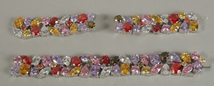 A .925 SILVER BRACELET AND DROP EARRINGS set with coloured stones.
