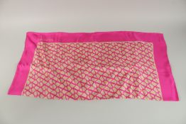 A VALENTINO SILK SCARF in a box.