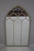 A GREY METAL ARCHED MIRROR 124cm high 61cm wide