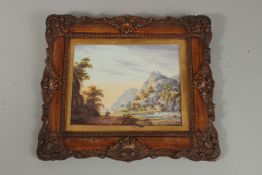 A PAINTED PORCELAIN PANEL depicting a European landscaped scene, panel inset within a wooden