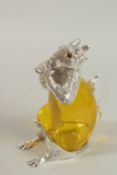 AN AMBER COLOURED GLASS NOVELTY CLARET JUG modelled as a squirrel, silver plated handles and feet.