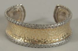 A .925 SILVER AND GILT BRACELET.