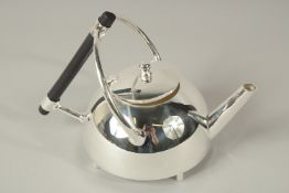 A CHRISTOPHER DRESSER DESIGN SILVER PLATED, CIRCULAR TEAPOT.