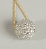 AN 18CT GOLD DIAMOND BALL NECKLACE.