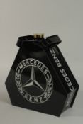 A BLACK PETROL CAN 